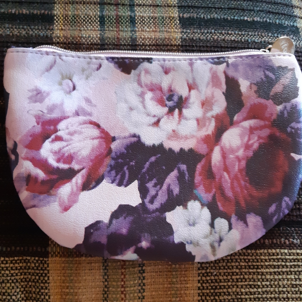Ipsy bag and four items.